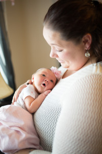 newborn baby girl listening to moms voice