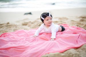 baby on pink blanket