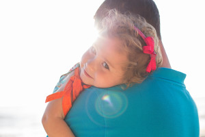 dad and daughter sun flare