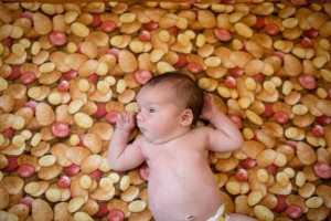 baby on potato blanket