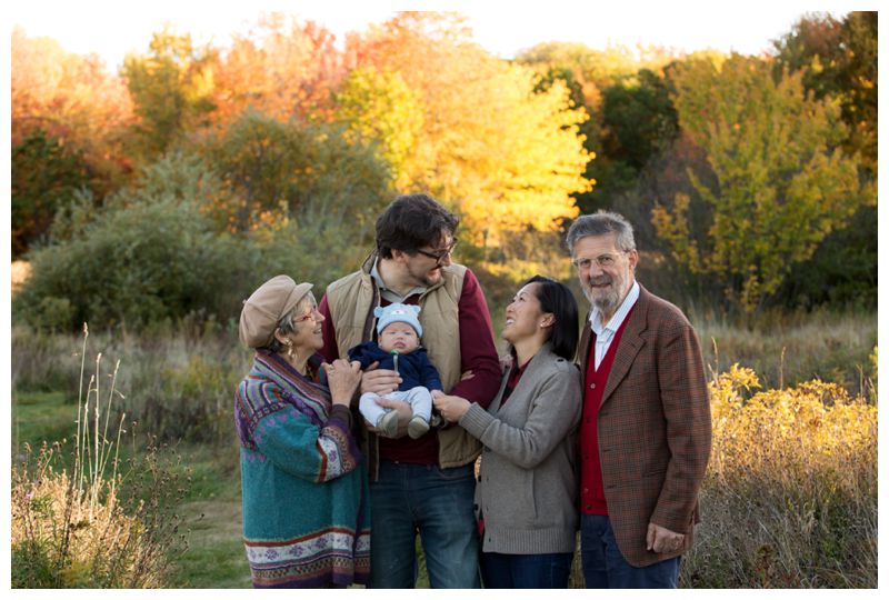grandparent and parents with new baby boy
