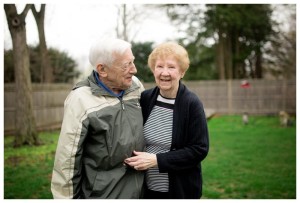 and old couple pose for photos
