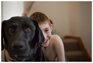 boy and black lab