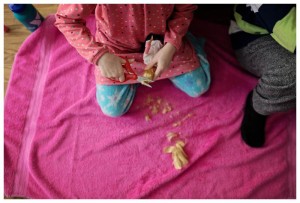 girl plays with barbies
