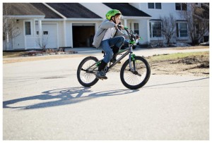 boy rides bike