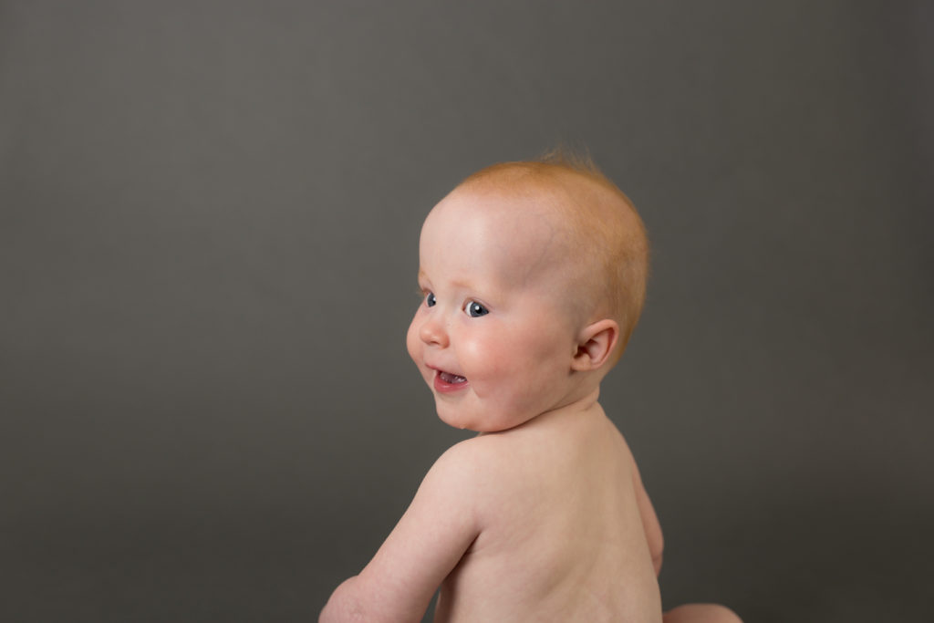 baby on gray backdrop