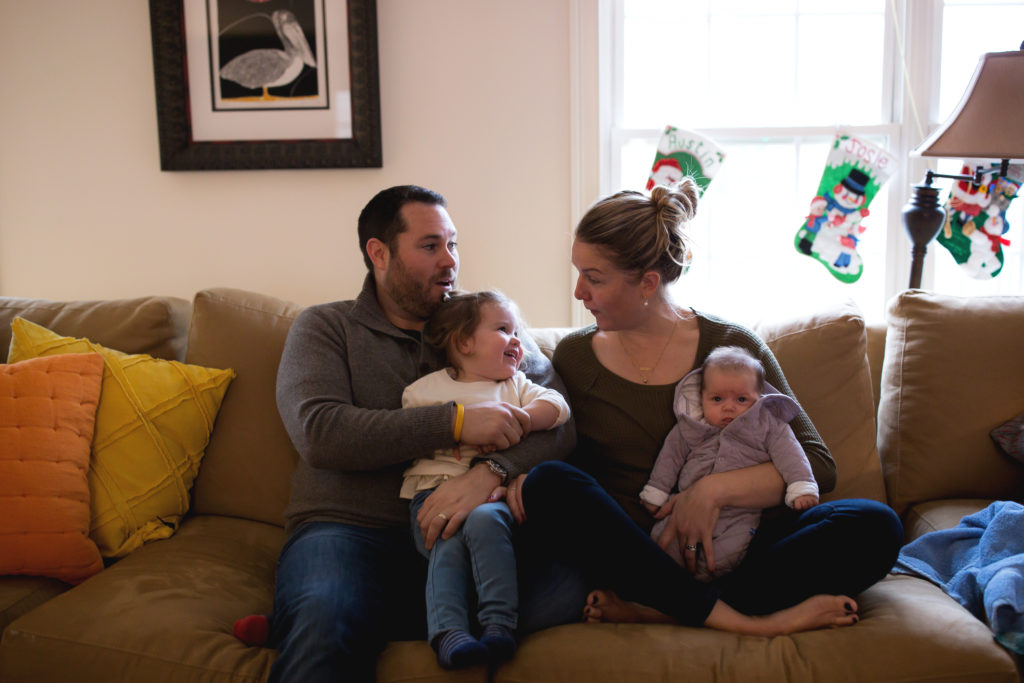 cute family in living room