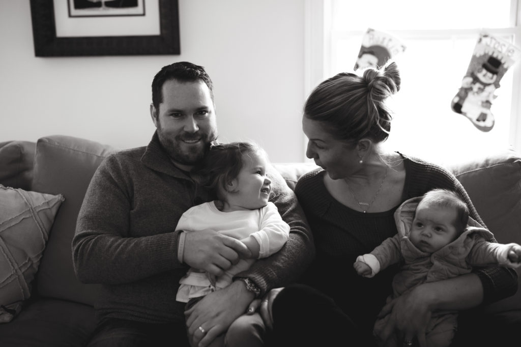 portland maine family poses on couch