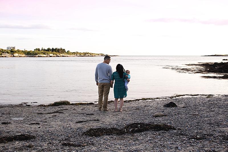 family looks out over ocean