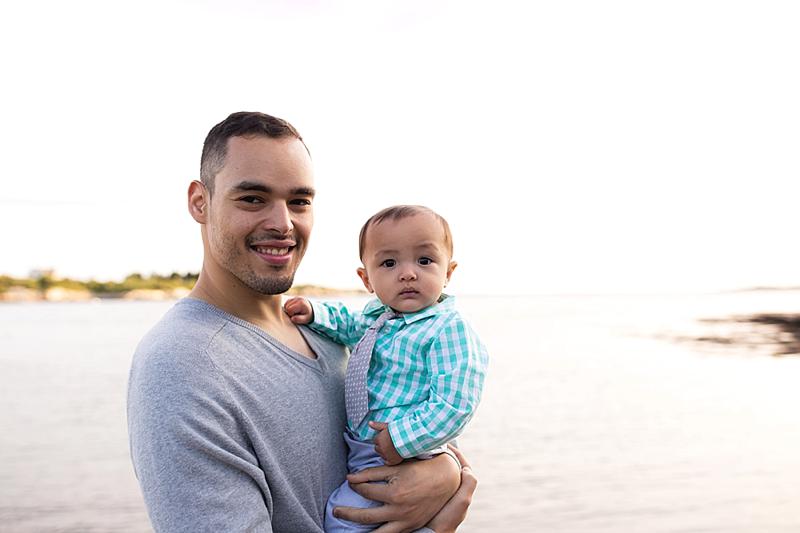 dad holds baby boy