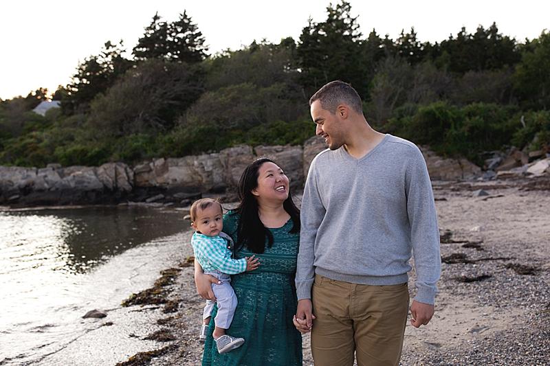 family walks on lands end beach