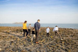 playing in rocks on beach