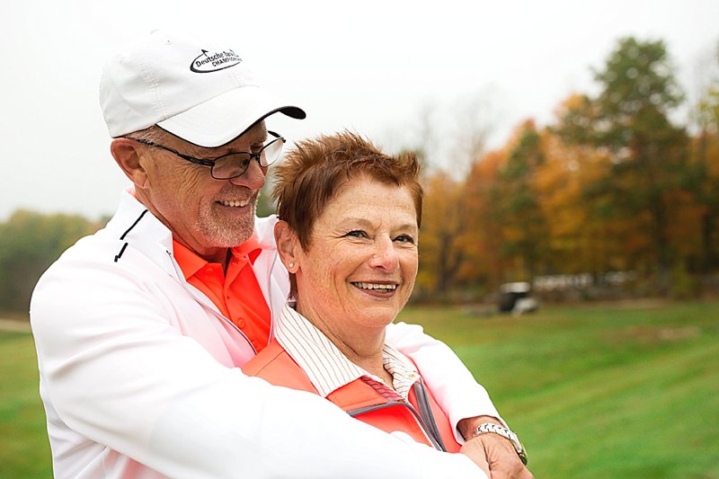 older couple at the golf course