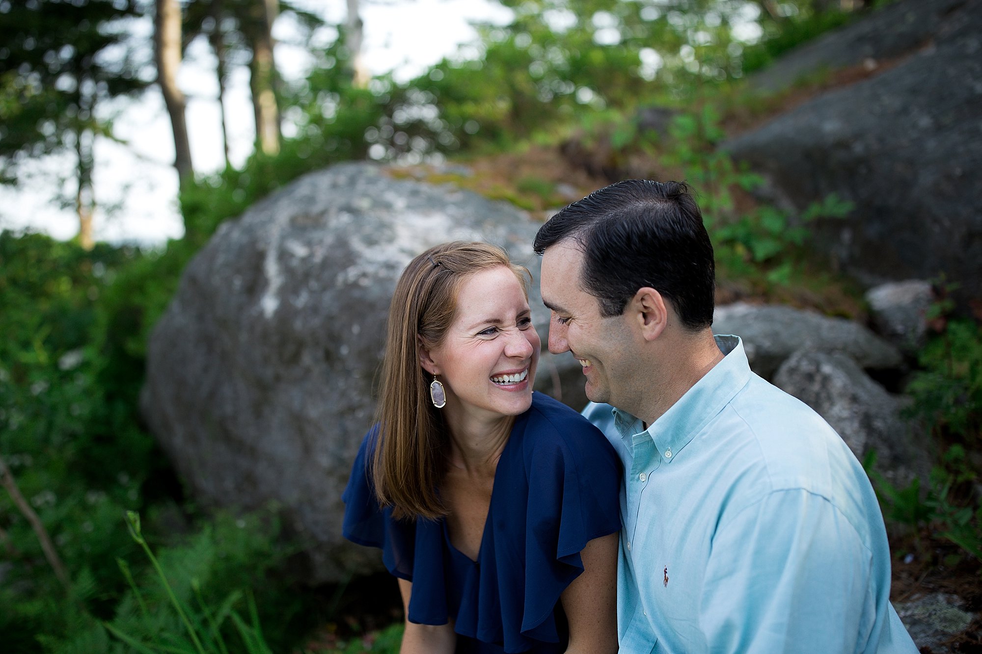 couple laugh together in Boothbay Maine