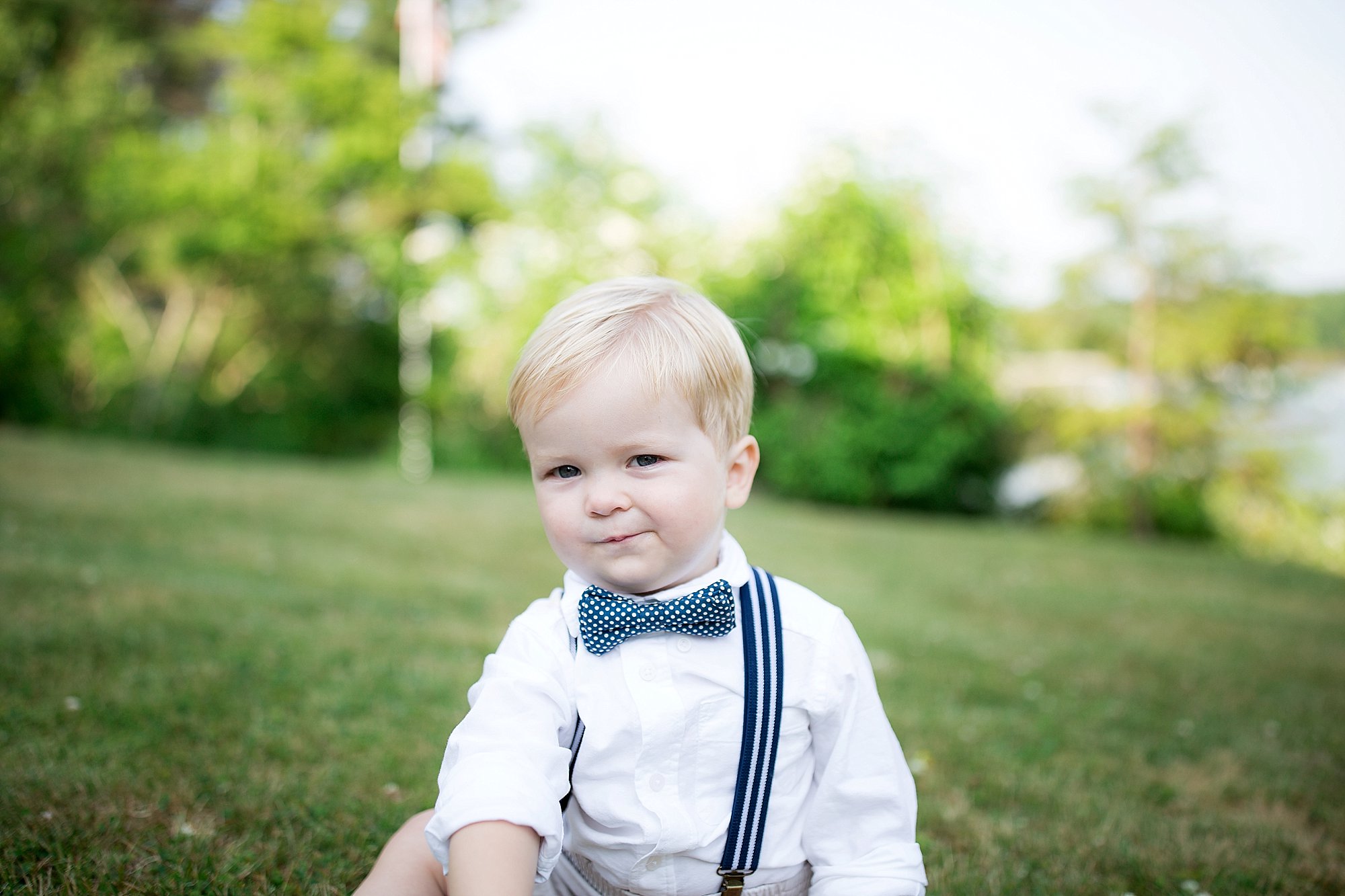 Little boy wears and boy tie and a smirk