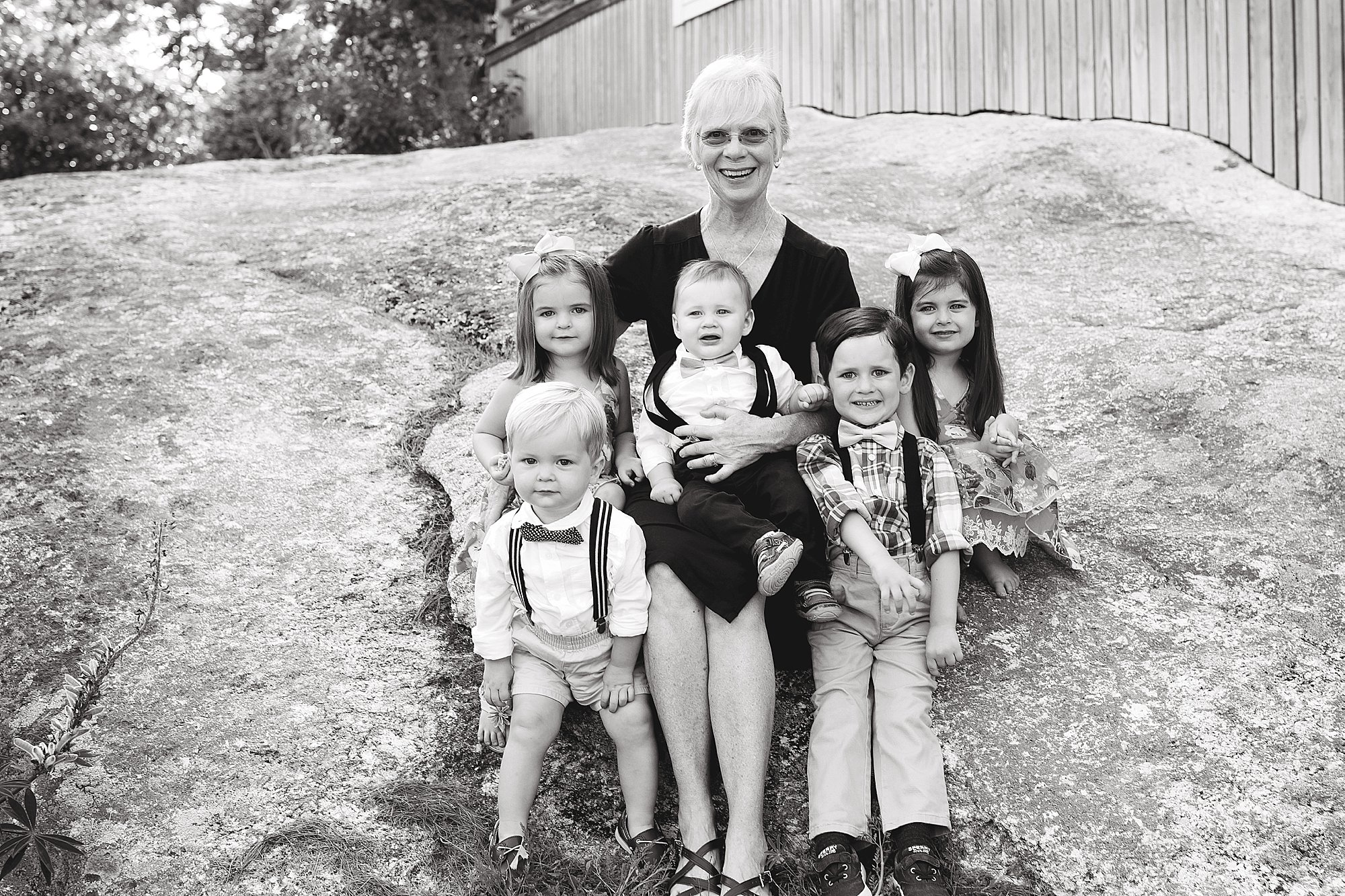 Grandmother poses with a group of grandkids