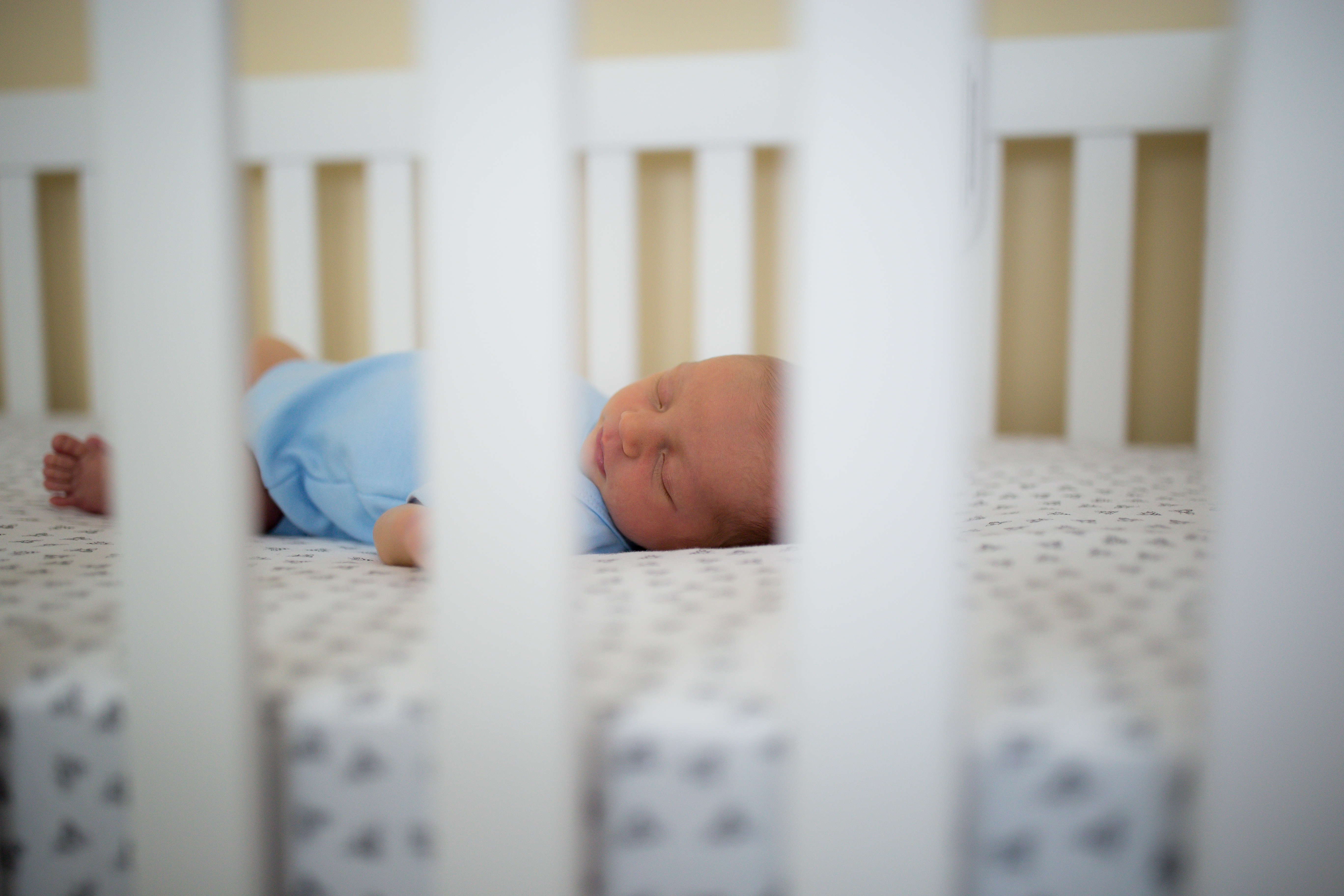 baby boy sleeping in crib